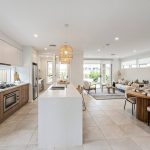 Open plan kitchen, living and dining n Tempo Living Melonba Display Home